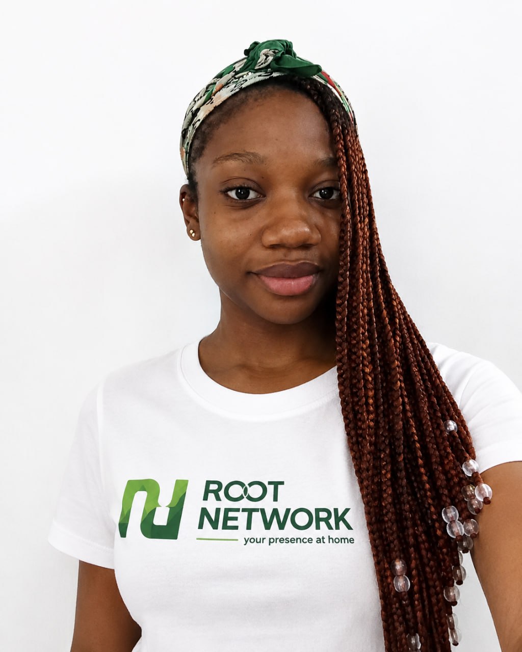 A Root Network team member wearing a Root Network shirt